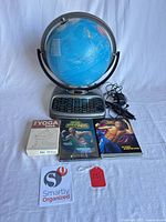 Entire lot showing SmartGlobe on base with stylus, cables, DVD case, Yoga Deck II