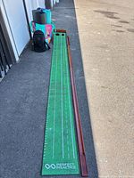 Full view of Perfect Practice putting mat, wooden rail, yoga mats bundle and fencing hood