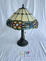 Full view of lamp showing shade, base and pull chain