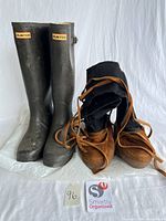 Both pairs of boots side by side showing overall style, color and wear