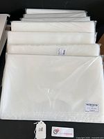 Stack of sealed Uline poly bag packs