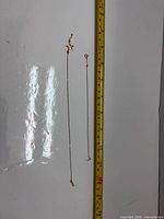 Bracelet pieces alongside tape measure