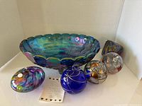 Bowl front view with five ornaments and tag
