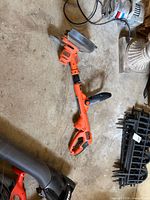 Full view of Black & Decker corded string trimmer/edger on floor