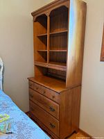 Full view of dresser with attached hutch showing shelves and drawers