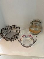 Group shot of basket, bowl and vase