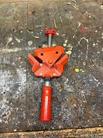 Full view of clamp showing jaws, screw rod and handle