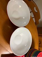 Top view of both stoneware bowls showing white interiors