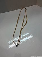 Full view of beaded necklace with pendant
