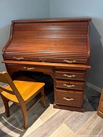 Desk closed with chair in front