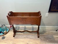 front view of brown wood planter stand