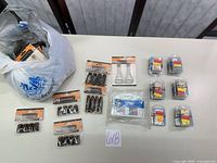 Overview of all packaged staples and glass vials on table