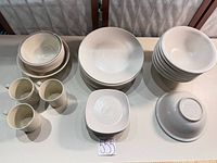 Dudson Evolution Pearl dinnerware sets laid out: plates, bowls, mugs