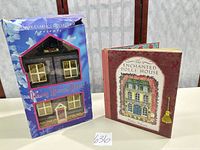 Front view of boxed musical dollhouse and hardcover book