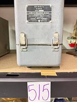 Front of case showing data plate CY-912/U and latches