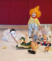 Group view of all eight clown figures
