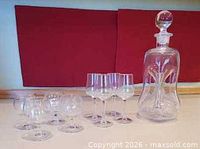 Group view decanter, five tall cordials, four snifter cordials