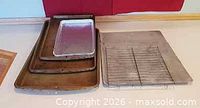 Stacked cookie sheets, foil tray, jelly roll pan with rack