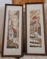 Both framed sketches side by side