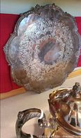 Close of tray detail and top of teapot handle