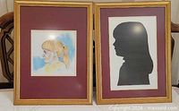 Both gold-tone frames side by side showing contents
