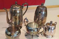 All five silver-plated pieces group shot