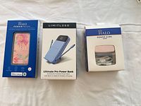 Front view of three boxed chargers