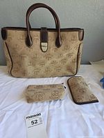 Front view of tote with pouch and eyeglass case