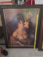 Front view of the framed portrait showing subjects and frame detail