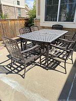 Full set showing table and six chairs