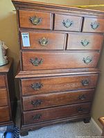 Full view of tall 7-drawer chest showing overall design and hardware