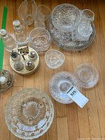 Group shot of all serveware pieces and metal caddy