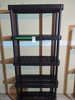 Front view showing all five shelves and structure
