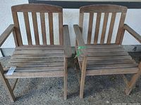 front view of both wood slatted armchairs