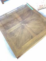 Top view showing veneer grain pattern and glass surface