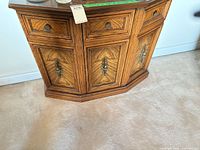 Front view showing overall nightstand design and hardware