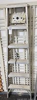 Full view of the 6-step aluminum ladder folded
