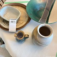 Group shot of all five pottery pieces