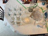 Group shot of all clear glass pieces on table