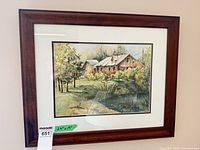 Full view of framed watercolor landscape painting
