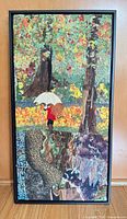 Full view of framed quilted artwork