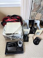 Overall lot showing printer, hub, duffel, file holders, headset, cables