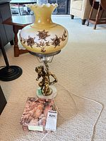 Full view of lamp with shade and cord visible