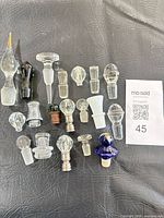 All stoppers laid out on surface displaying quantity and variety