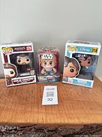 Group shot of all three boxed figures