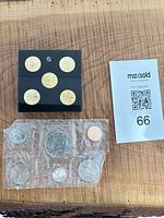 Overall view of display block, cellophane pouch and loose cent