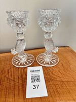 Front view of both bird candlesticks