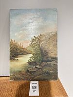 Full view of vertical unframed oil on board landscape painting