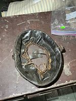 Top view of leather helmet liner showing overall condition