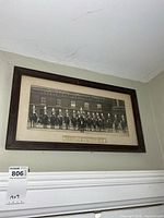 Entire framed photograph on wall